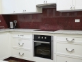Valley White Granite top with Ruby Red Marble Splashback